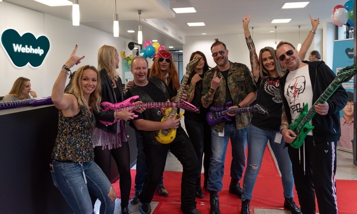 Mitarbeiter als Rockstars am Advisor's Day in Nürnberg. Weiterer Text über ots und www.presseportal.de/nr/125617 / Die Verwendung dieses Bildes ist für redaktionelle Zwecke honorarfrei. Veröffentlichung bitte unter Quellenangabe: "obs/Webhelp/Martin Kloha"
