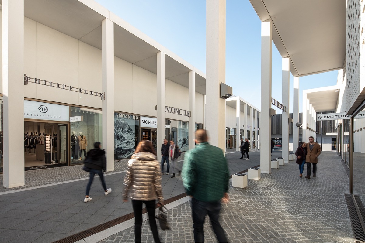 Outletcity Metzingen: Holy AG und Outletcity Metzingen GmbH  werden zu OUTLETCITY AG