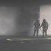 FW-OE: Feuer in leerstehendem Industriekomplex Einsatzkräfte der Feuerwehr bei Löscharbeiten in der verrauchten Halle. Foto: Feuerwehr Attendorn